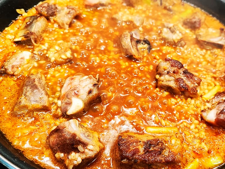 Paella with pork ribs. Step 13