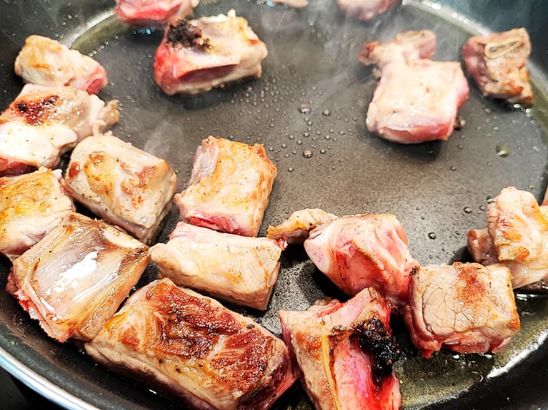 Paella with pork ribs. Step 6