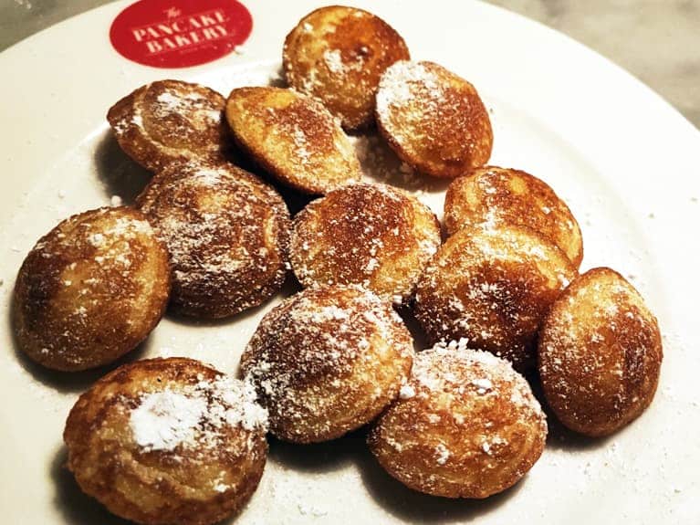 If you are hungry and do not know what to eat in Amsterdam, poffertjes are typical Dutch food