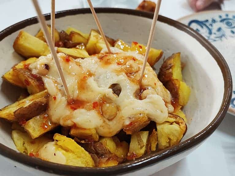 Patatas bravas a la valenciana del Restaurante La Pepica